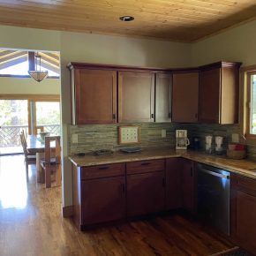 Kitchen cabinets with view to dining area