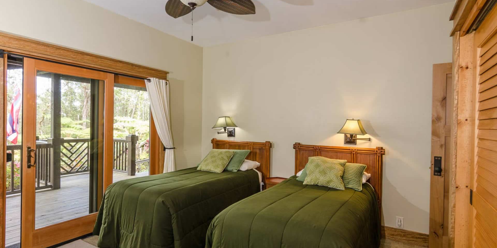 Aloha Room with two twin beds and forest views from private lania